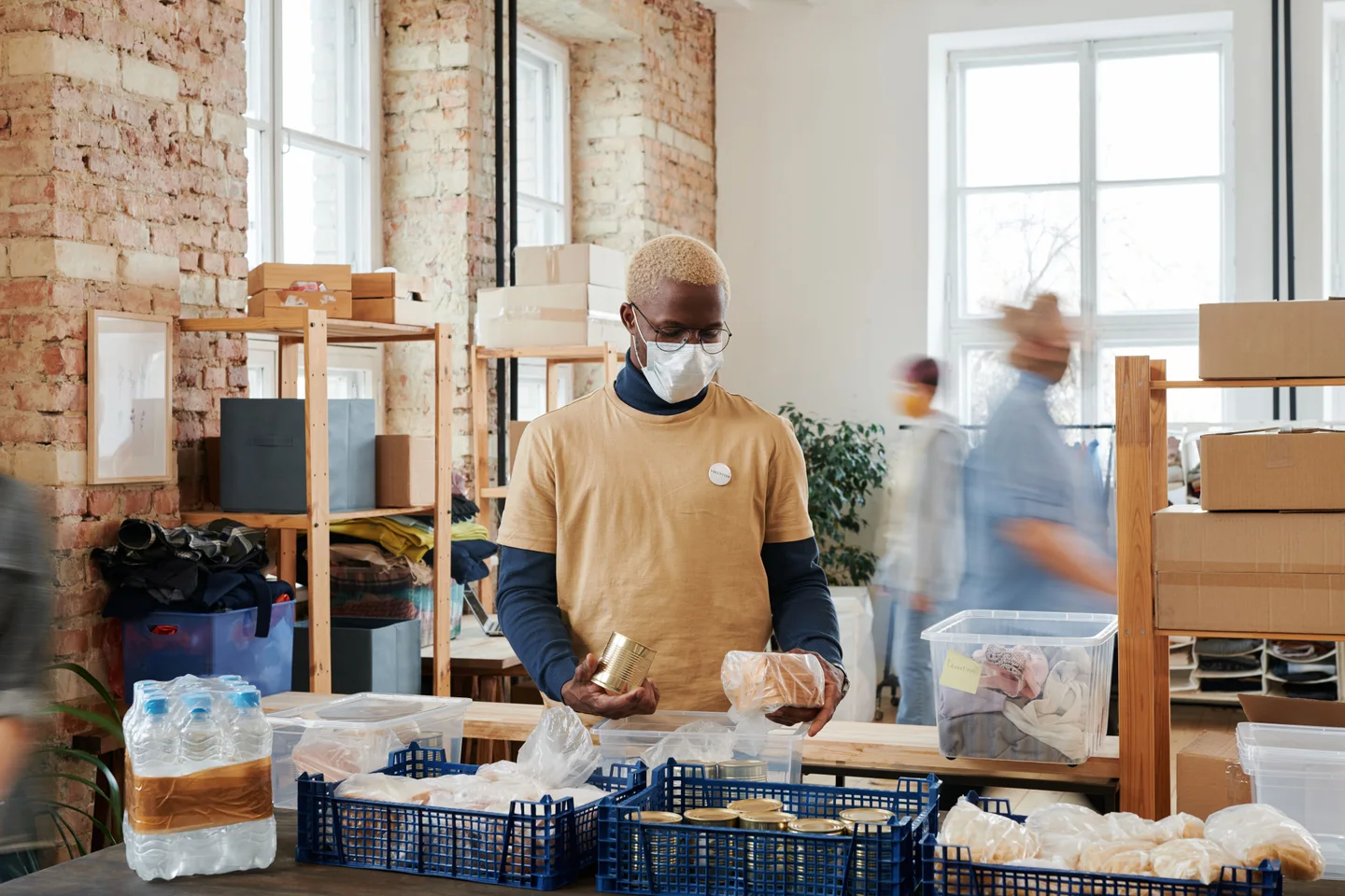 Volunteers organizing food donations for distribution
